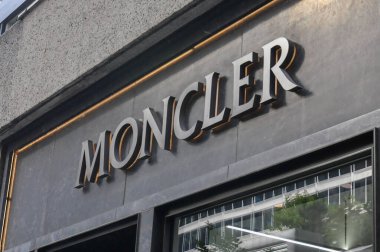 Toronto, ON, Canada - September 18, 2025: A modern Moncler sign graces the stylish storefront with large windows.