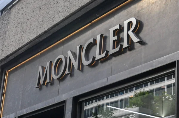 Toronto, ON, Canada - September 18, 2025: A modern Moncler sign graces the stylish storefront with large windows.