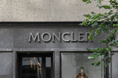 Toronto, ON, Canada - September 18, 2025: A modern Moncler sign graces the stylish storefront with large windows.