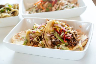 Two Homemade Shredded Pork Flatbread Tacos