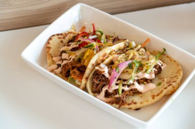 Two Homemade Shredded Pork Flatbread Tacos