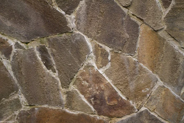 Een natuursteen. muur, fundering. metselwerk. grote steen — Stockfoto