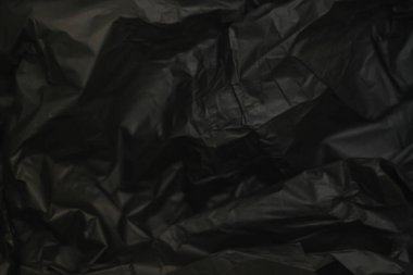 Siyah buruşuk kağıt. yapı, doku, arkaplan, çürükler