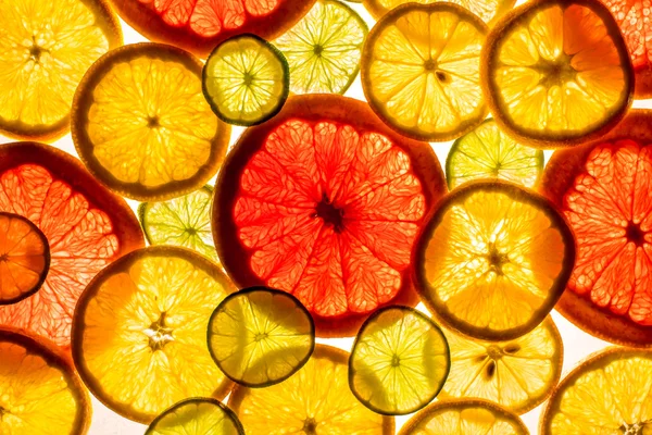 Plátky citrusových plodů pozadí — Stock fotografie