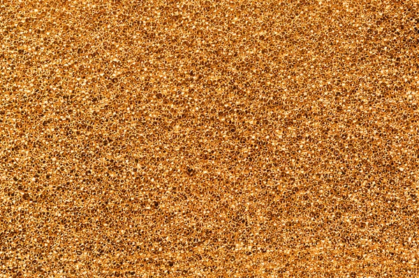 Abstract golden sparkle glitter background