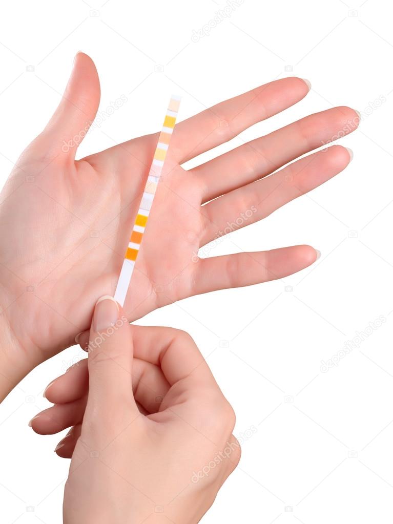 Hands with test strip