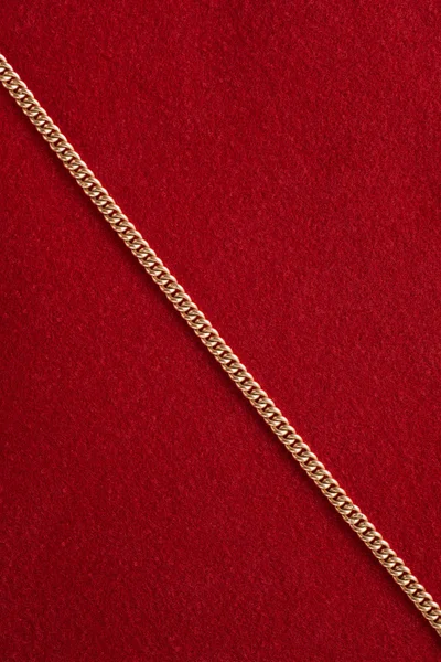 Golden chain on red background – stockfoto