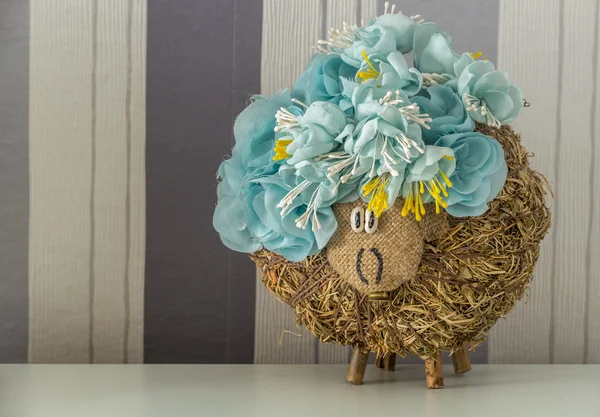 Handmade hey sheep with blue flowers — Stock Photo, Image