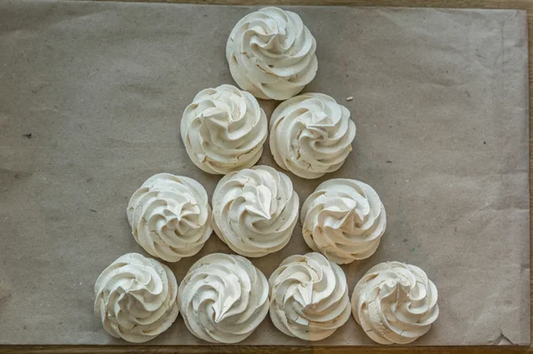 Creamy meringues in a triangle — Stock Photo, Image