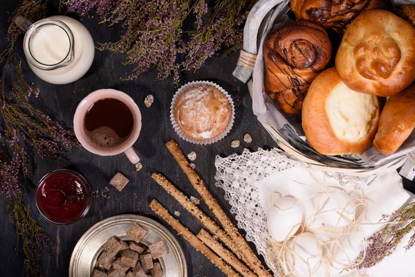 Pastries and bread sticks with ingredients — Stock Photo, Image