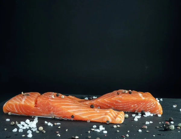 Close up raw salmon fillet with spices. — Stock Photo, Image