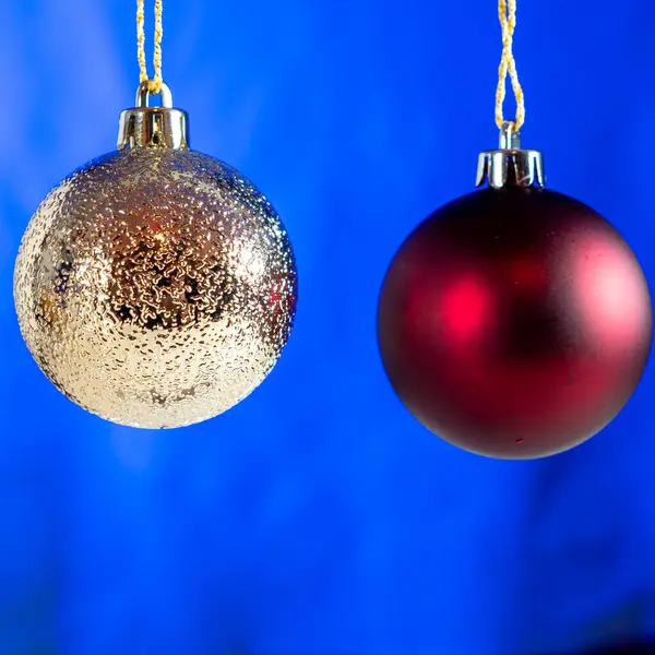 Christmas balls on a blue background. — Stock Photo, Image