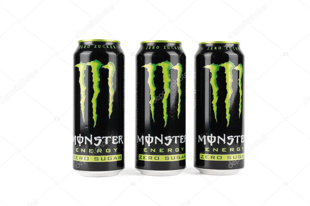 Germany Berlin October 18, 2025. Three Monster Energy Zero Sugar cans arranged in a row isolated on a white background. Symmetrical composition showing product branding.