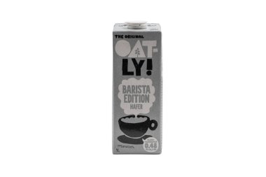 Almanya 6 Kasım 2025. Oatly Barista versiyonu. Oatly Barista 'nın yulaf ezmeli süt kutusunun önü. Kahve ve günlük kullanım için popüler vegan süt alternatifi.