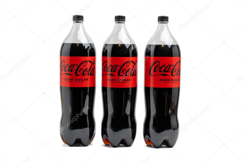 Germany Berlin November 6, 2025. Three Coca-Cola Zero Bottles. Three 2L Coca-Cola Zero Sugar bottles side by side. Refreshing carbonated drink with bold red branding.