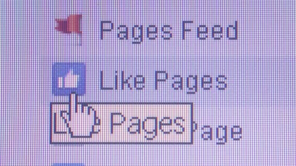 CALIFORNIA, JULY 2016:Social Media Macro: Cursor moves over Facebook 'pages' list, dolly offscreen — Stock Video