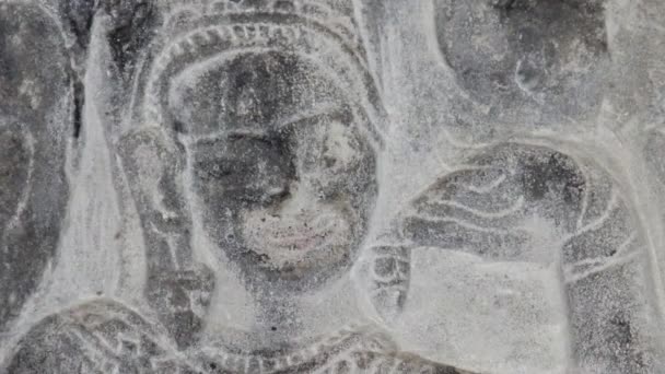 Ancient Temple (Angkor) - Bas-relief detail tilt down from dancer ECU — Stock Video