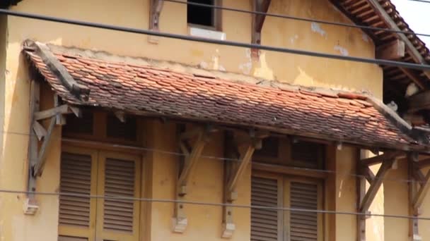 French Colonial: MCU Tilt down old French Colonial prison in Asia — Stock Video