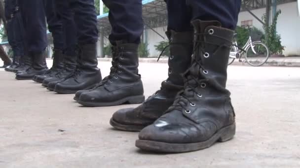 PHNOM PENH,CAMBODIA-SEPTEMBER 13, 2012:Close Up: Row of Boots Stepping in Unison — Stock Video