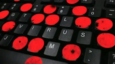 Computer Virus - Dolly move Computer Keyboard with keys spelling 'Virus'