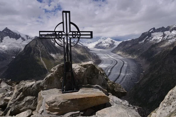 cross on Mountain Peak in Switzerland