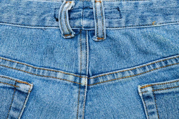 Close up image of blue denim jeans background or texture. — Stock Photo, Image