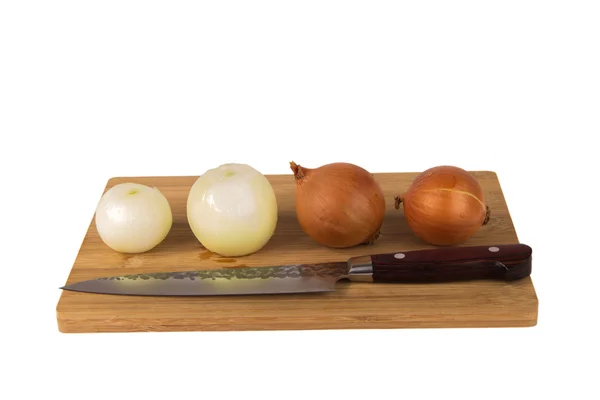 Fresh sliced onions on a board on a white background — Stock Photo, Image