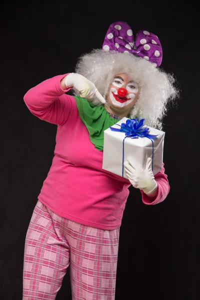 Funny clown with shaggy hair and a cheerful make-up — Stock Photo, Image