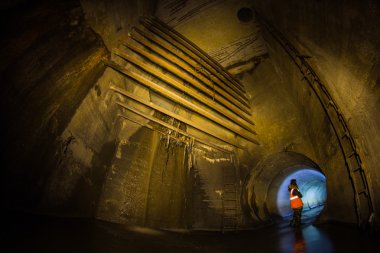 Girl and underground waterfall