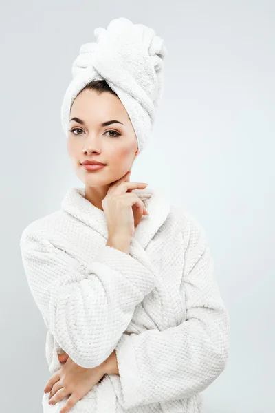 Girl wearing towel and bathrobe — Stock Photo, Image