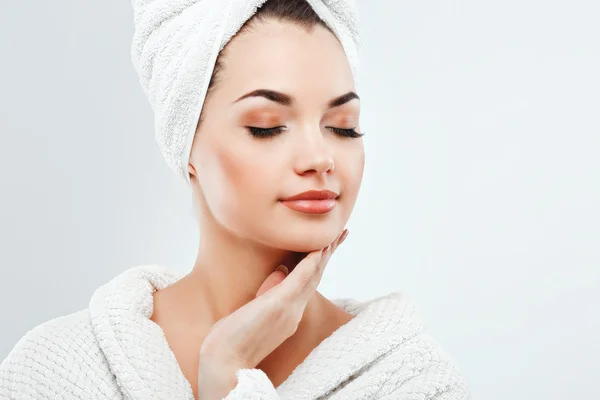 Girl wearing towel and bathrobe — Stock Photo, Image