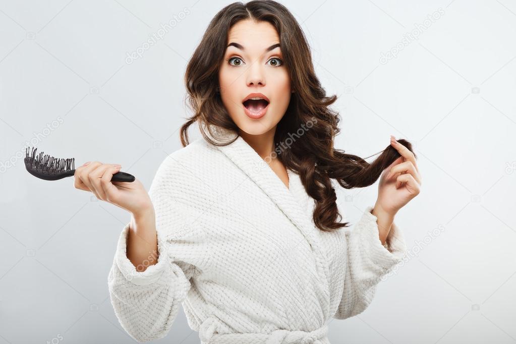 Girl holding a hair brush