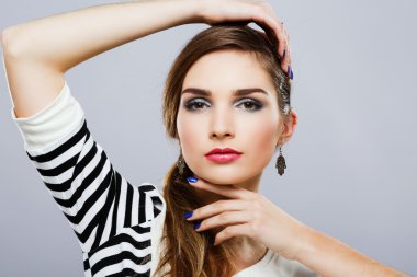Young girl with colorful make up