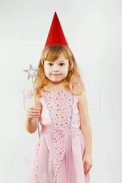 Little girl posing with magic stick — Stock Fotó