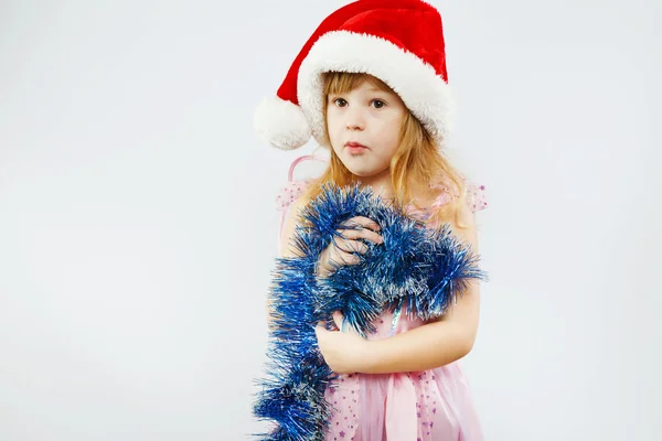 Nice young girl holding blue garland — Stock Photo, Image