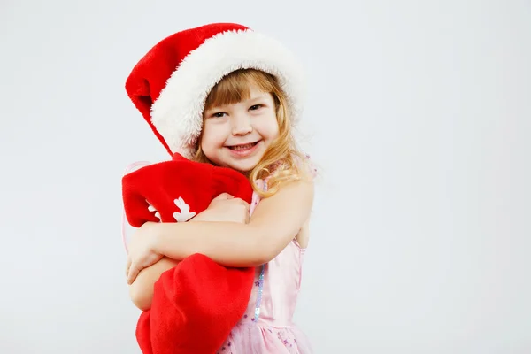 Happy little girl posing with red bag — Stock Photo, Image