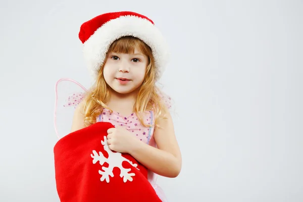 Pretty little blond girl with red bag — Stock Photo, Image