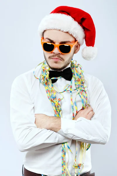 Serious young man posing in orange sunglasses — Stock Photo, Image