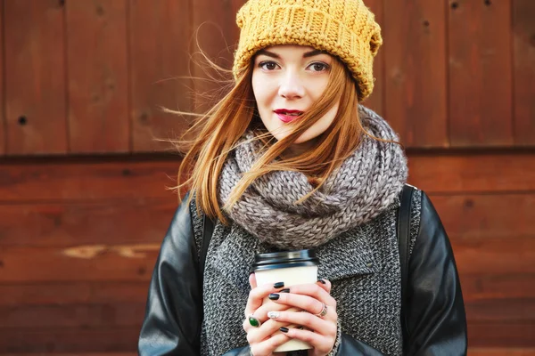 Beautiful girl with coffee outdoors Royalty Free Stock Images