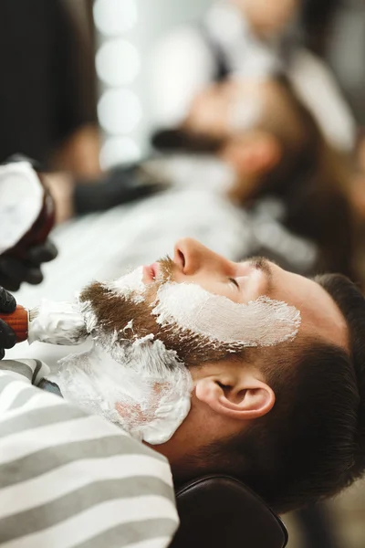 Barbers making a beard form for clients — Stock Photo, Image