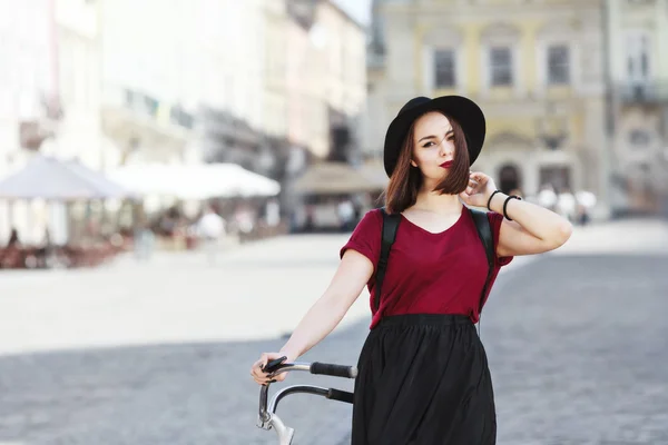 Young girl with bicycle — Stock Photo, Image