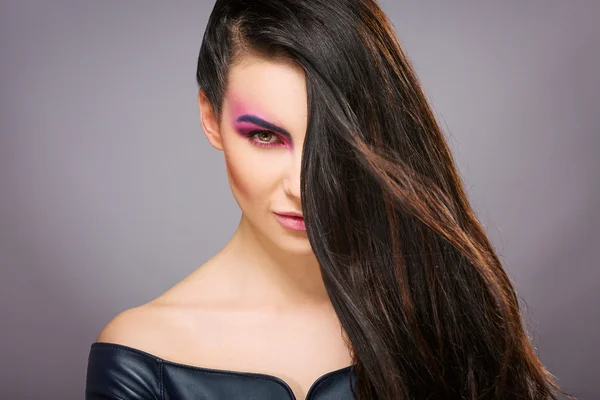 Beautiful model with bright colorful makeup — Stock Photo, Image