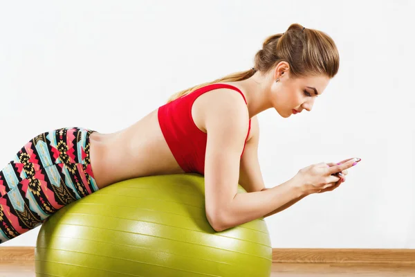 Menina fazendo exercícios — Fotografia de Stock