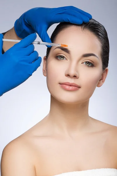 Model having plastic operation Royalty Free Stock Photos