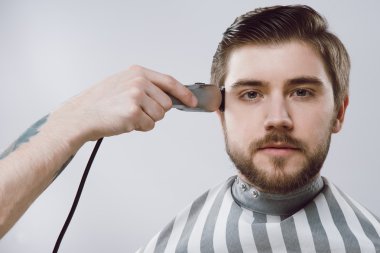 Male client at barbershop clipart