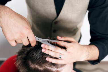 Barber giving a new haircut