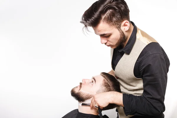 Joven barbero y cliente —  Fotos de Stock