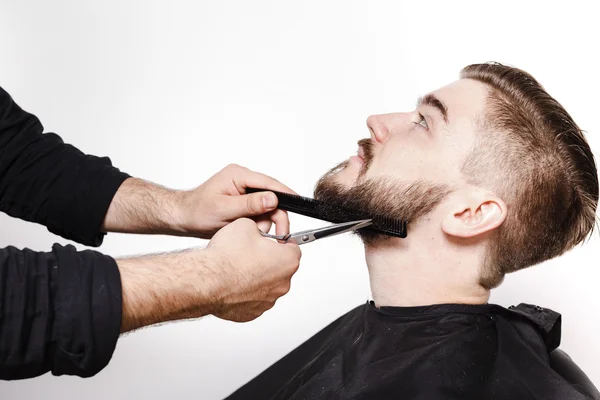 Man getting his beard shaved — Stock Photo, Image