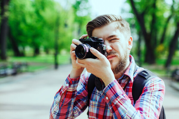 Young man photographe