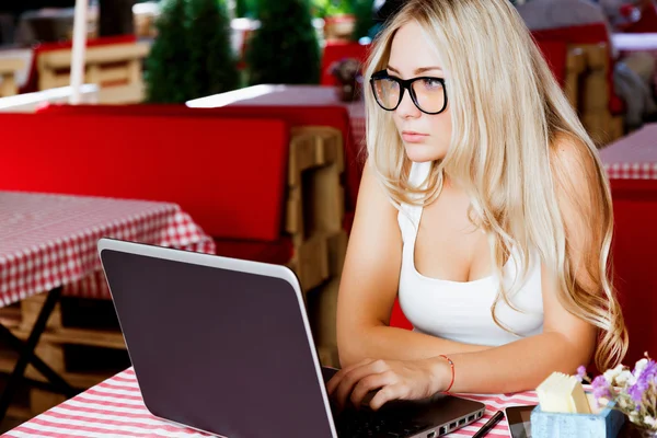 Charming girl with laptop — Stock Photo, Image